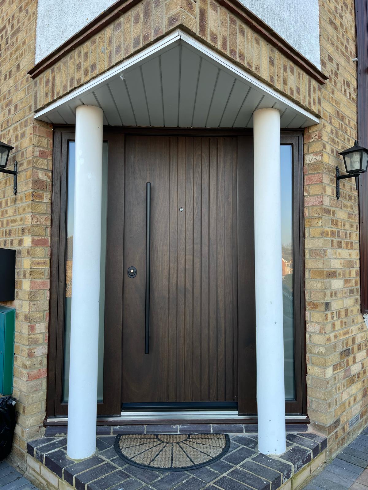 Walnut ribbed steel door with classical columns