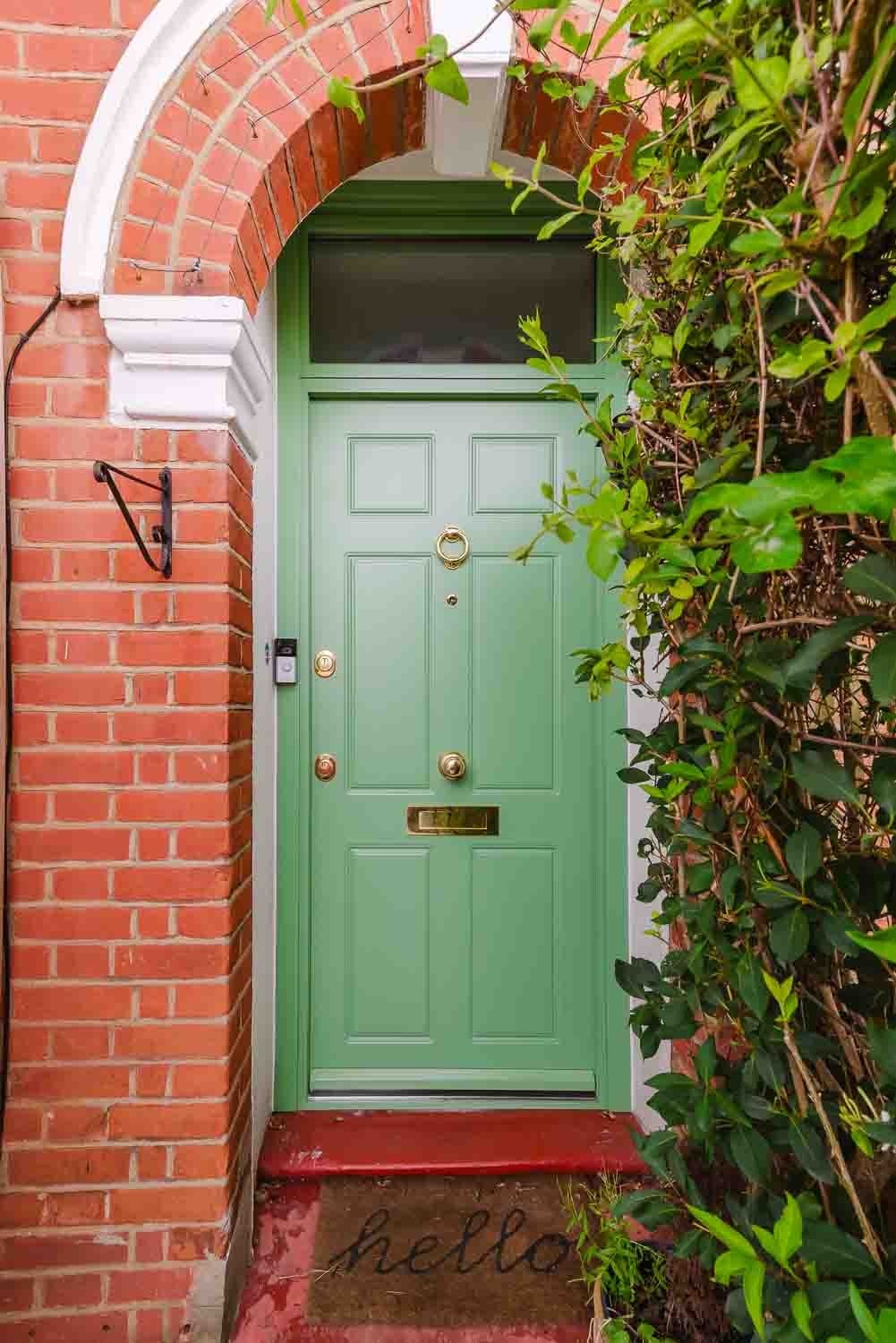 Sage traditional steel door with arched brick